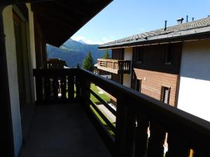 a balcony of a house with a view of the mountains at Residence Edelweiss C331 in Bellwald