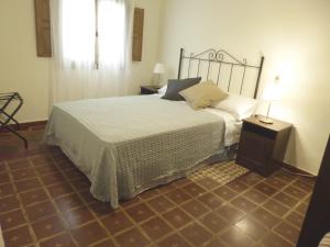 Łóżko lub łóżka w pokoju w obiekcie La Serrana de la Vera Casa Rural TR-CC-00366