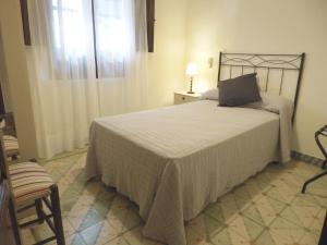 Łóżko lub łóżka w pokoju w obiekcie La Serrana de la Vera Casa Rural TR-CC-00366