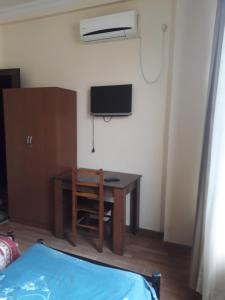 TV a/nebo společenská místnost v ubytování George Dom