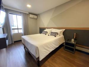 เตียงในห้องที่ Central Park Flat Residence - Home Time