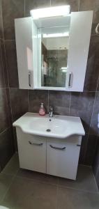Ванная комната в Suluca Homes
