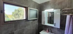 Ванная комната в Suluca Homes