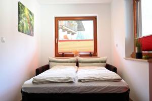 Voodi või voodid majutusasutuse Appartement Wanneck toas