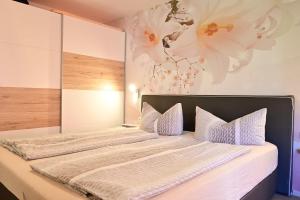 Postel nebo postele na pokoji v ubytování Appartement Wanneck
