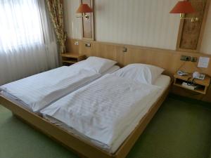 Postel nebo postele na pokoji v ubytování Schaperkrug