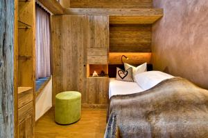 Postel nebo postele na pokoji v ubytování PETE Alpine Boutique Hotel - klein und fein - Private SPA Suiten und Zimmer