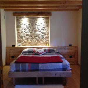 Postel nebo postele na pokoji v ubytování Gai De Sora Bio charming B&B