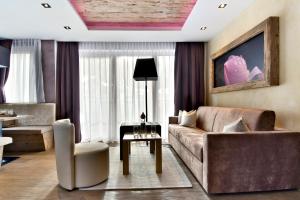 Posezení v ubytování PETE Alpine Boutique Hotel - klein und fein - Private SPA Suiten und Zimmer