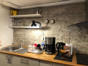 Kuchyň nebo kuchyňský kout v ubytování Kauba 6a apartment