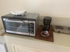 Nhà bếp/bếp nhỏ tại Lar do Mar - Sabrina U07 - Cond. Pipa Privillege