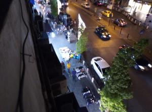 a view of a street with cars parked on the road at Al Naser Hotel in Amman