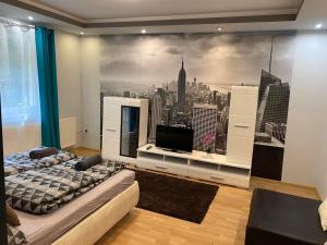 Posteľ alebo postele v izbe v ubytovaní Gabrielle2 apartman