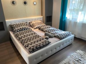 Posteľ alebo postele v izbe v ubytovaní Gabrielle2 apartman