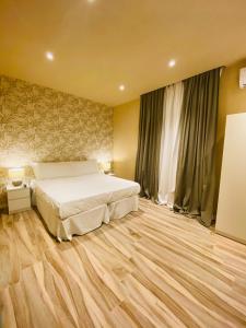 Posteľ alebo postele v izbe v ubytovaní Harmony House Prestige