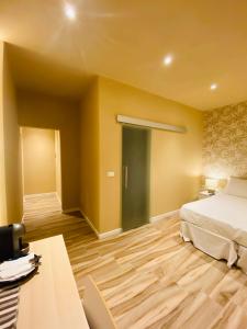 Posteľ alebo postele v izbe v ubytovaní Harmony House Prestige