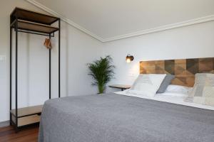 Ένα ή περισσότερα κρεβάτια σε δωμάτιο στο Casa Rural La Palmera - Landetxea