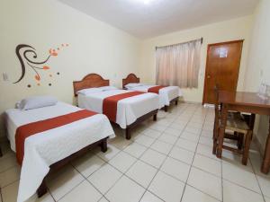 Una habitación de Hotel y Restaurante Villas Del Sol Jalpan