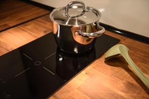 a coffee pot sitting on top of a stove at Bayonne en plein cœur Centre Historique 2 chambres in Bayonne