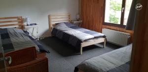 Postel nebo postele na pokoji v ubytování LATYKA B&B