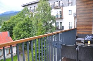 Nespecifikovaný výhled na hory nebo výhled na hory při pohledu z apartmánu
