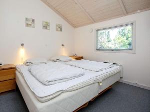 8 person holiday home in Faxe Ladeplads 객실 침대