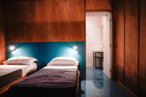 Katil atau katil-katil dalam bilik di NAP Hostel Spaccanapoli