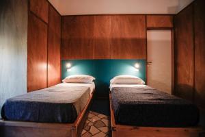 Katil atau katil-katil dalam bilik di NAP Hostel Spaccanapoli