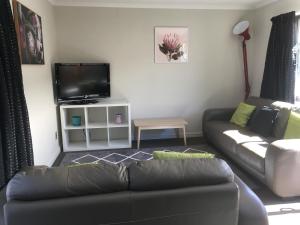 TV a/nebo společenská místnost v ubytování Kauri Motel on Riccarton + 18 fotografií