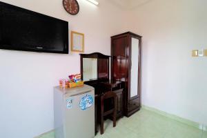 TV/trung tâm giải trí tại RedDoorz near Vincom Cong Hoa