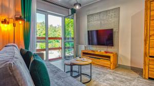 Кът за сядане в Apartament Studio Holiday Mountain Residence - 5D Apartamenty
