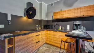 Kuchyň nebo kuchyňský kout v ubytování Apartament Studio Holiday Mountain Residence - 5D Apartamenty