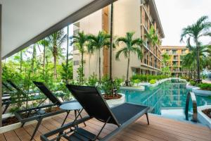 Imagine din galeria proprietății La Flora Khao Lak - SHA Extra Plus în Khao Lak +85 fotografii