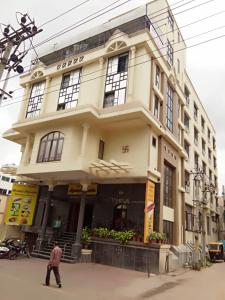 The facade or entrance of Hotel Vyshak International