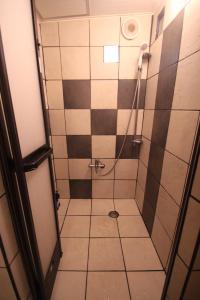Ванна кімната в Taketomijima Guesthouse and je Taime