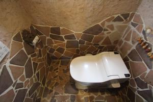 Ванна кімната в Taketomijima Guesthouse and je Taime