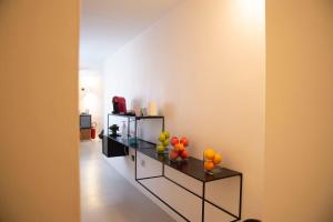 a room with a shelf with fruits on it at Residenza Pantaleo in Rome