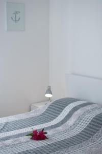 Postel nebo postele na pokoji v ubytování Villas Faro