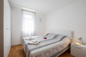 Postel nebo postele na pokoji v ubytování Villas Faro