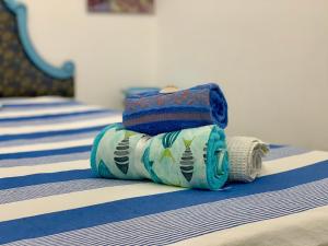 Posteľ alebo postele v izbe v ubytovaní La finestrella dell’arte un orizzonte da guardare