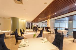ห้องอาหารหรือที่รับประทานอาหารของ Holiday Inn Shanghai Vista, an IHG Hotel