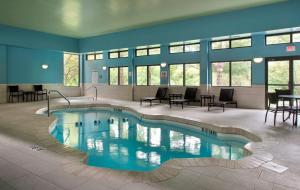 a large swimming pool in a large room at Holiday Inn Express Great Barrington, an IHG Hotel in Great Barrington