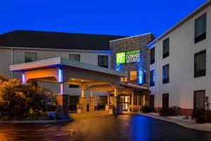 a hotel with a gas station at night at Holiday Inn Express Great Barrington by IHG in Great Barrington