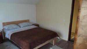 A bed or beds in a room at Apartment Sijakovic