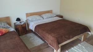 A bed or beds in a room at Apartment Sijakovic
