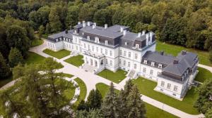 an aerial view of a large white house with trees at Sanatoriy Voronovo in Voronovo