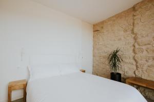 A bed or beds in a room at VT en San Vicente de la Sonsierra