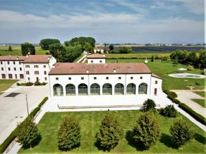 an aerial view of a large white building at Agriturismo Casalbergo in Isola della Scala
