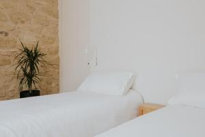 A bed or beds in a room at VT en San Vicente de la Sonsierra