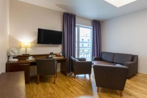 TV a/nebo společenská místnost v ubytování Viiking Spa Hotel